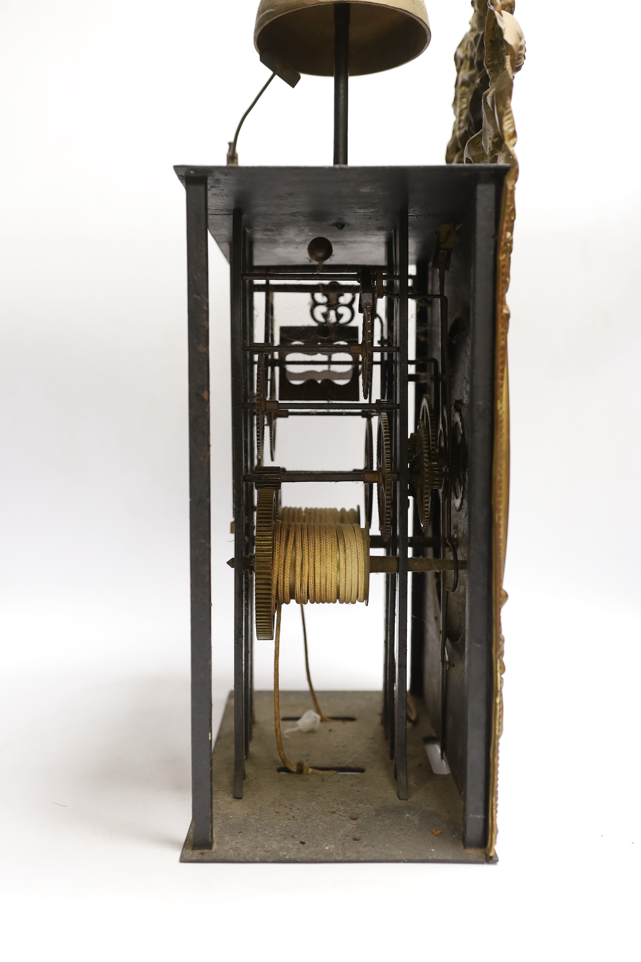 A 19th century French eight day longcase clock movement, with circular enamelled dial with weights, clock front 45cm high